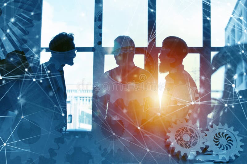 Business team with gears system. Teamwork, partnership and integration concept with network effect. double exposure royalty free stock image