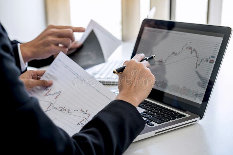 Business team investment working with computer and analysis graph stock market trading with stock chart data, business and stock images Business team investment working with computer and analysis graph stock market trading with stock chart data, business and stock images