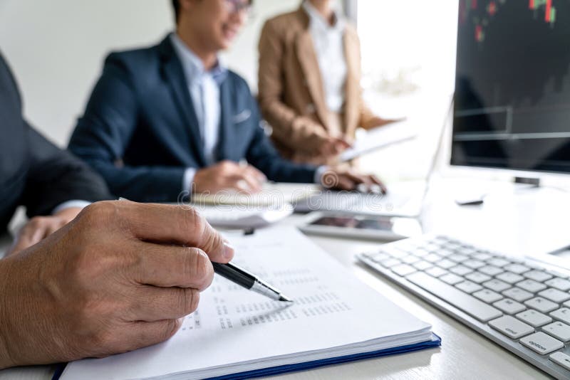 Business team investment working with computer, planning and analyzing graph stock market trading with stock chart data, business royalty free stock image Business team investment working with computer, planning and analyzing graph stock market trading with stock chart data, business royalty free stock image