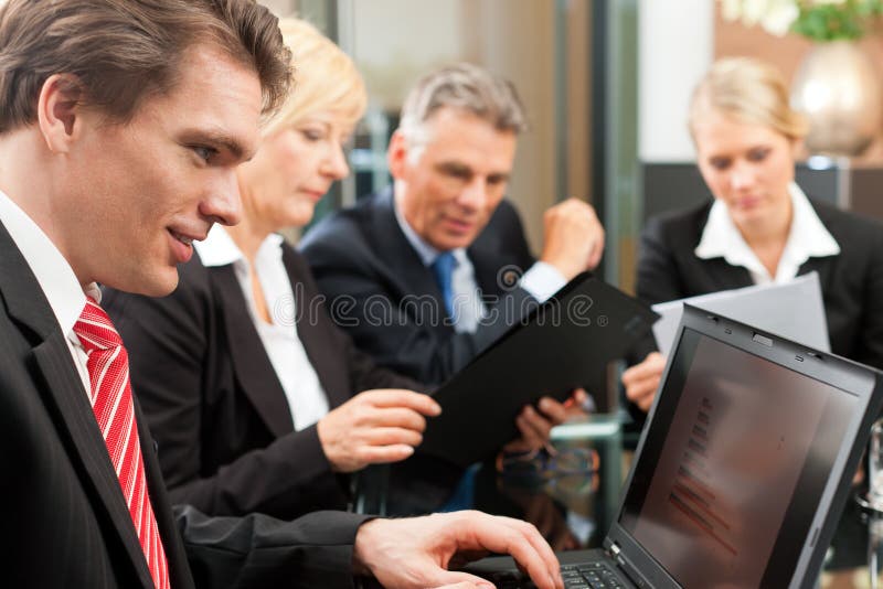 Business - team meeting in an office royalty free stock image Business - team meeting in an office royalty free stock image