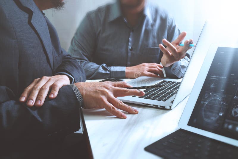 Business team meeting. Photo professional investor working new s. Computer, modern.