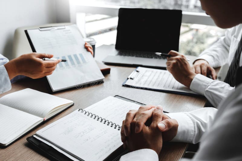 Business team meeting Strategy Planning with new startup project plan Finance and Economy Graph with laptop successful teamwork stock photography Business team meeting Strategy Planning with new startup project plan Finance and Economy Graph with laptop successful teamwork stock photography