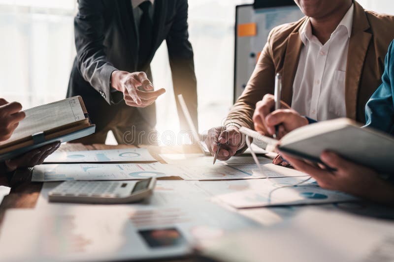 Business Team Working with Financial Document at Office. Analysis