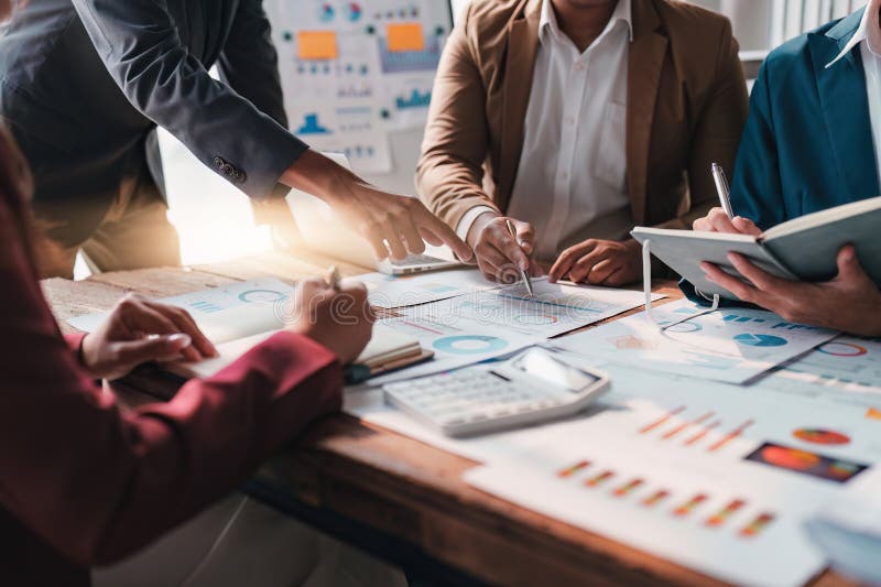 Business Team Working with Financial Document at Office. Analysis