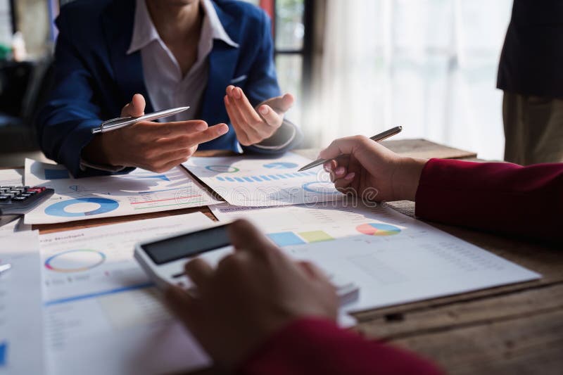 Business Team Working with Financial Document at Office. Analysis