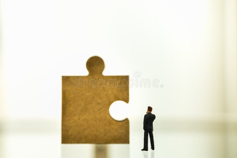 Business, Teamwork, Planning And Work Concept. Close Up Of Businessman Miniature Figure People Standing And Looking To Wooden