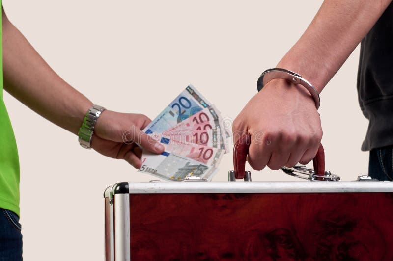 Business Transfer Deal. Handover of a Suitcase for Money Stock Image