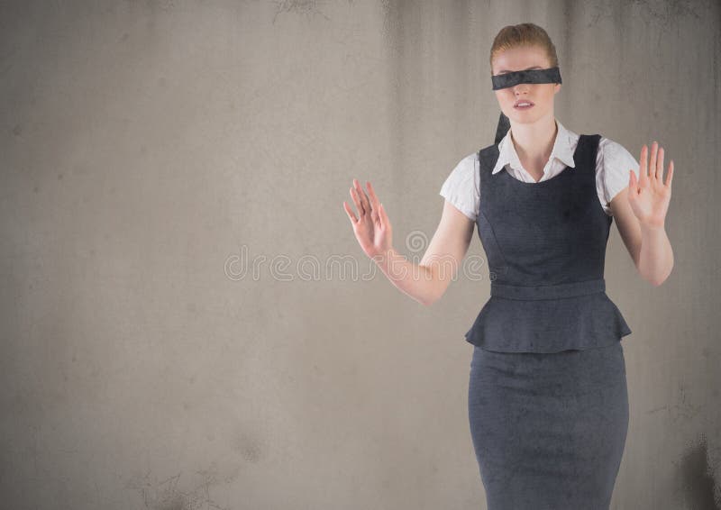 confused blindfolded woman on a white background Stock Photo