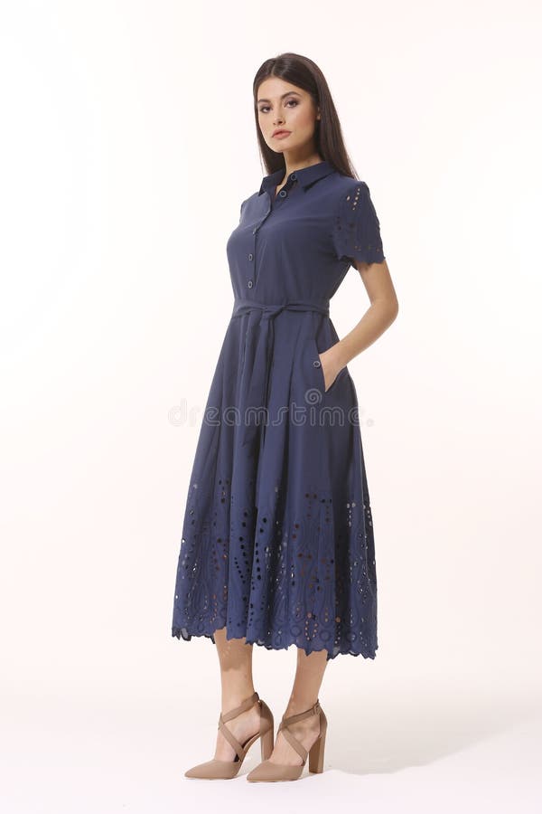 Indian business woman executive posing in formal blue lace long skirt summer dress full body length isolated on white. Indian business woman executive posing in formal blue lace long skirt summer dress full body length isolated on white