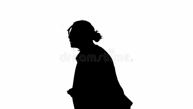 Business woman in formal outfit walking checking hand watch and starts running. Half-turn. Black silhouette on a white. Modern businesswoman creative