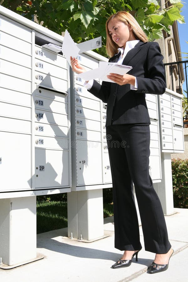 Business Woman Getting Mail stock photos Business Woman Getting Mail stock photos