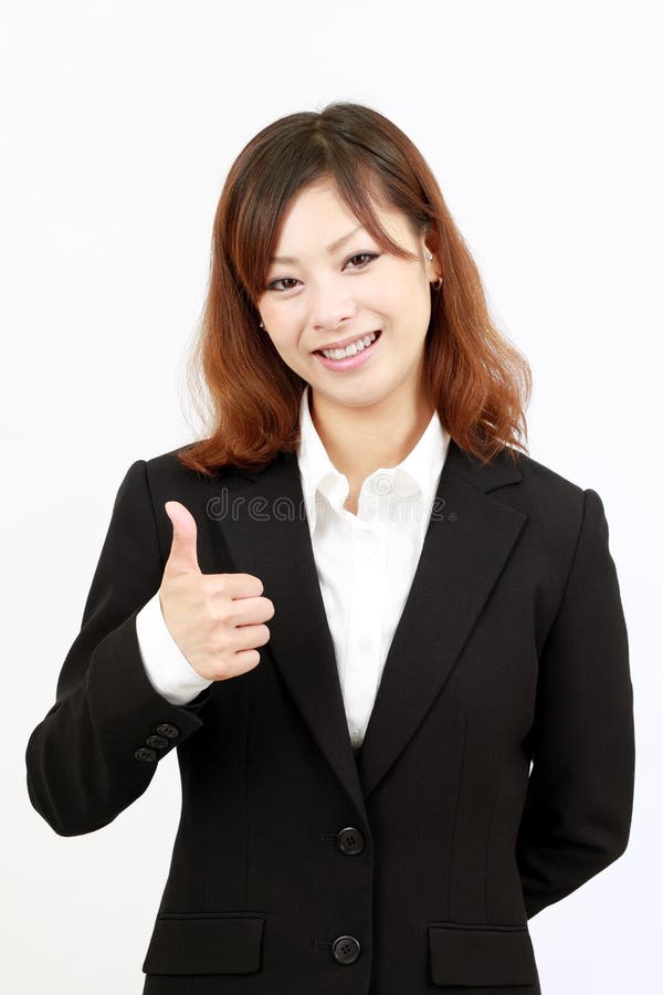 Business woman giving thumb up