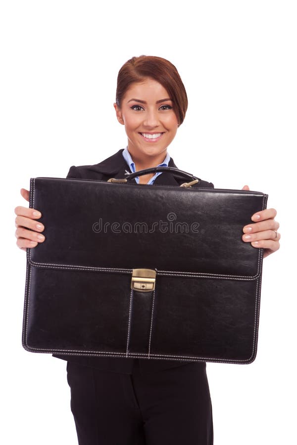 Business woman handing a suit case to you