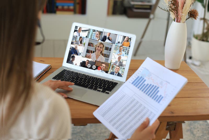 Business woman in headphones talking to her colleagues in video conference. royalty free stock photography Business woman in headphones talking to her colleagues in video conference. royalty free stock photography