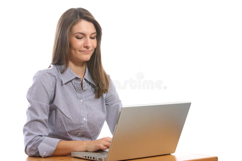 A business woman on her laptop at a desk