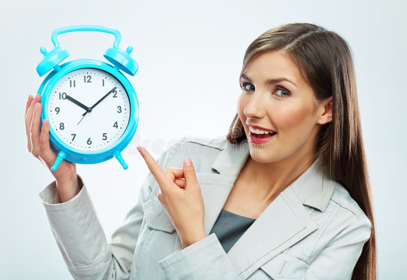 Business woman hold watch. Time concept. Smiling girl portrait