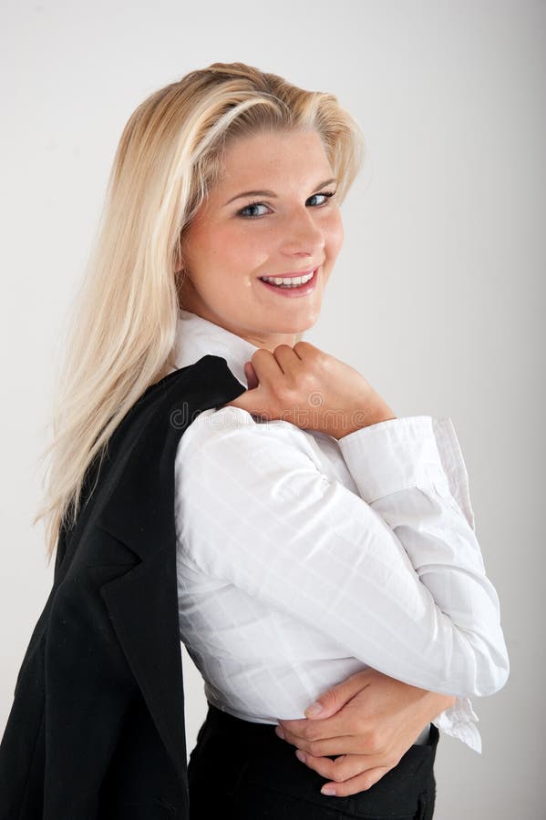 Business woman holding a jacket