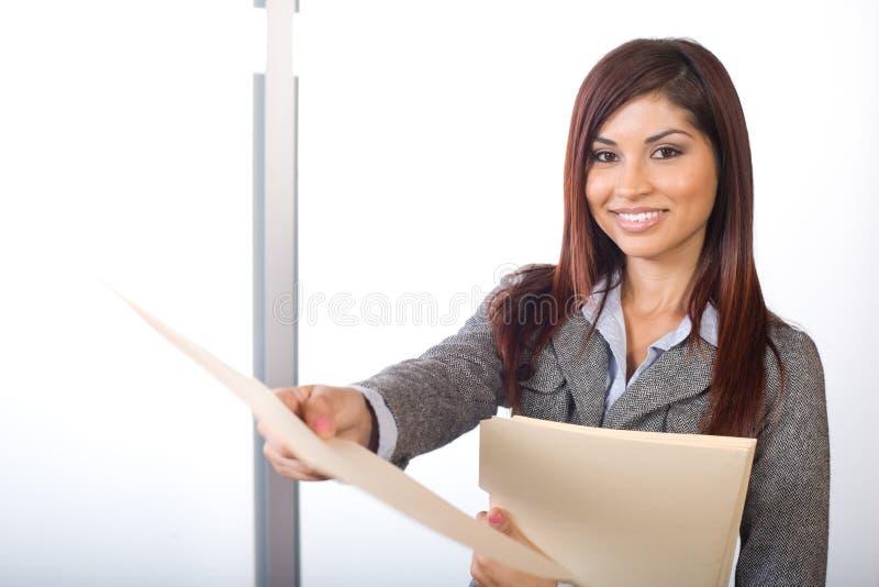 Business woman holding legal documents