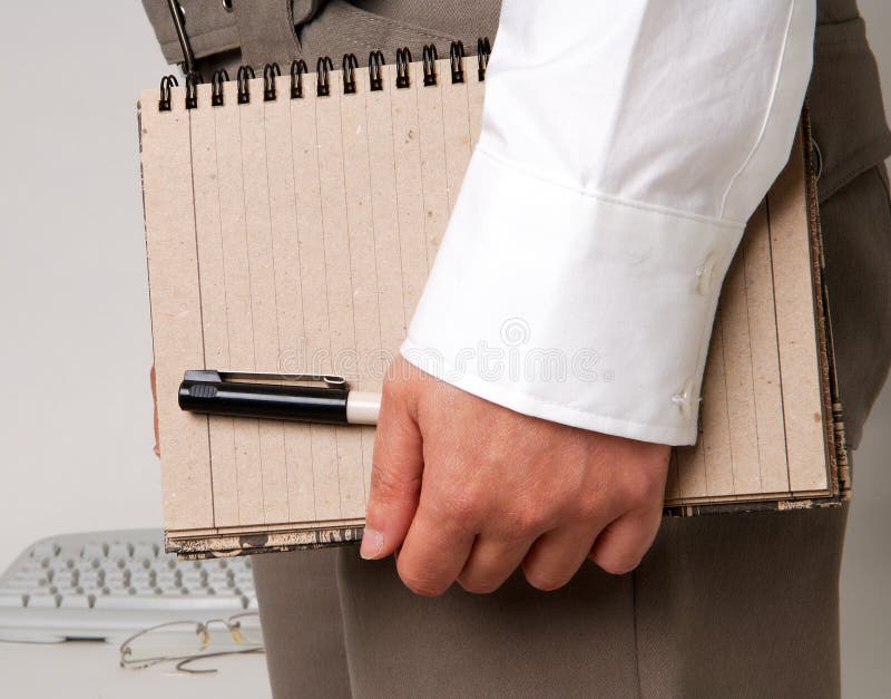 Business woman holding note pad