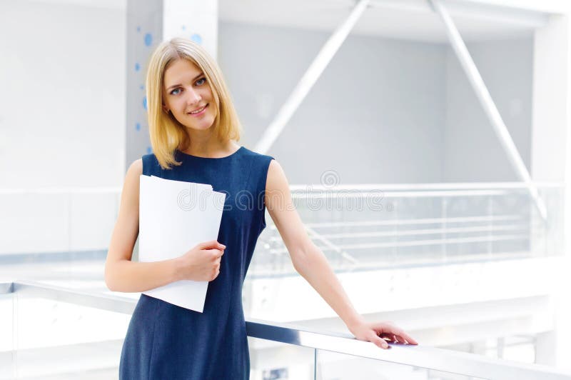 371 Happy Business Woman Holding Reports Stock Photos Free & Royalty