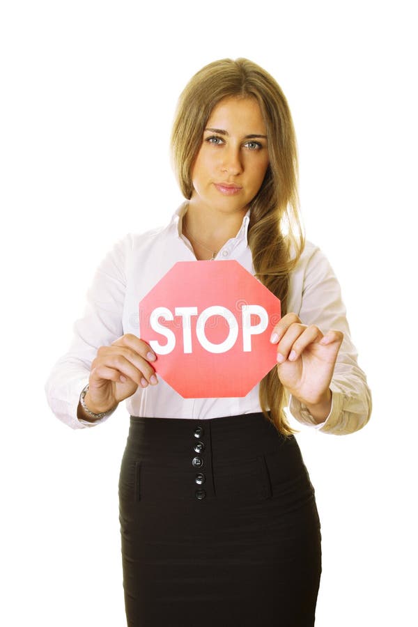 Business woman holding a STOP sign