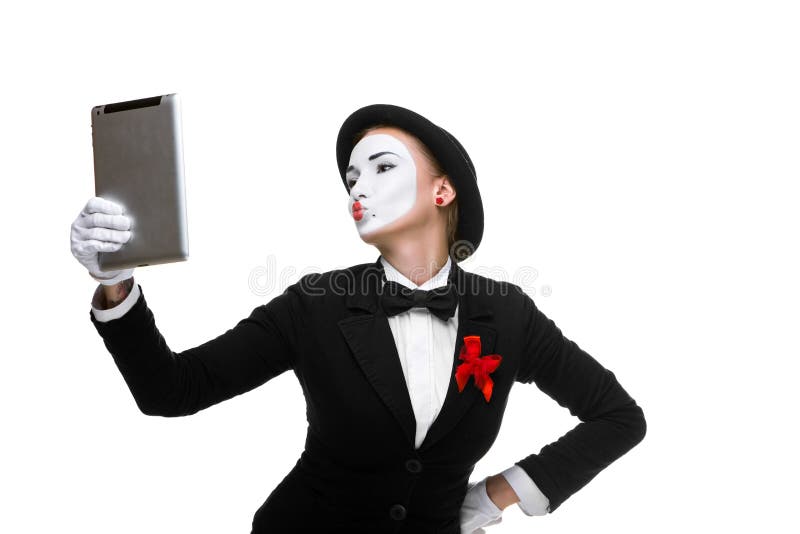 Business woman in the image mime holding tablet PC stock image Business woman in the image mime holding tablet PC stock image