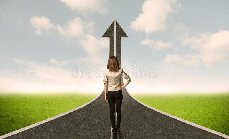 Business woman lokking at 3d road with up arrow royalty free stock photo Business woman lokking at 3d road with up arrow royalty free stock photo