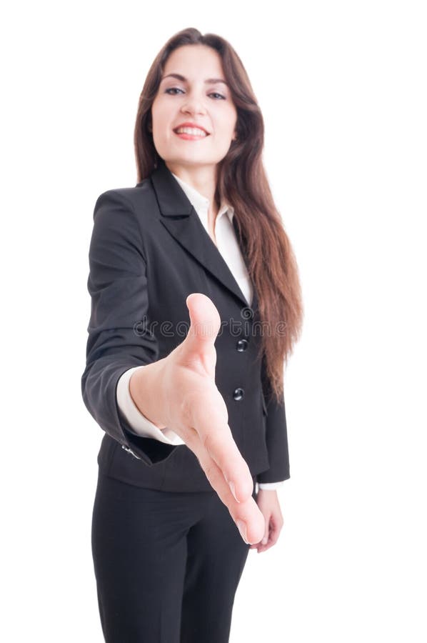 Business woman offering handshake with selective focus on hand royalty free stock photos