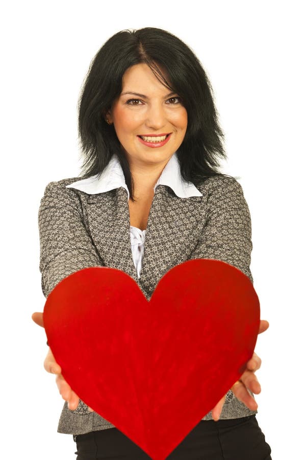 Business woman offering heart