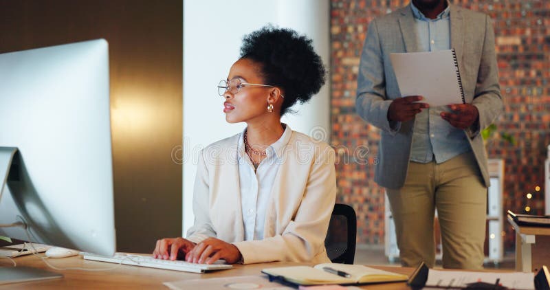 Business woman, office and computer for marketing report, social media management and online editing at night. Professional african writer, editor or worker typing on desktop for copywriting research. Editing project stock images, royalty-free photos and pictures