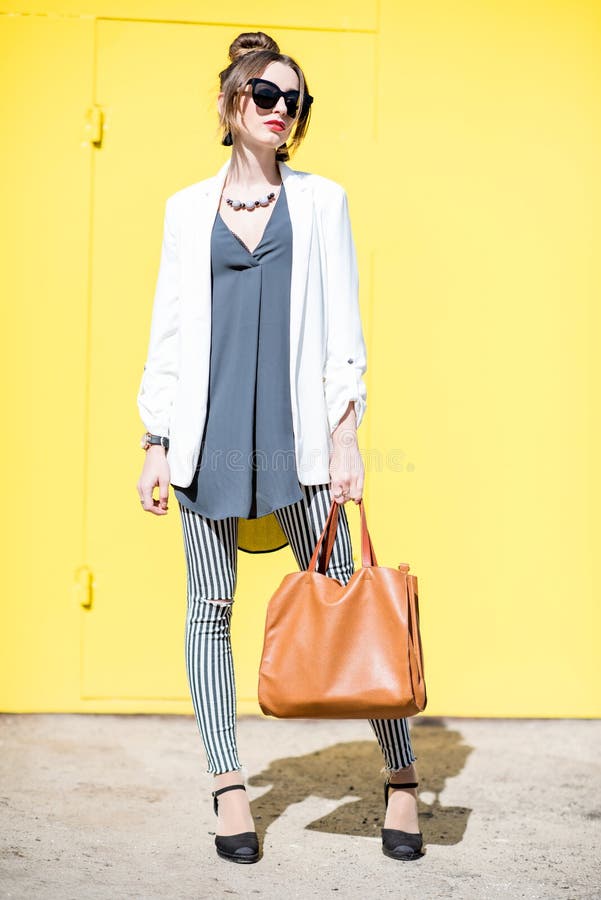 Business Woman Portrait on the Yellow Background Outdoors Stock Photo ...