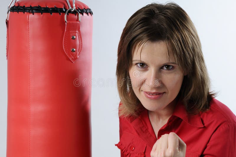Business Woman and Punching Bag Stock Photo Image of fighting