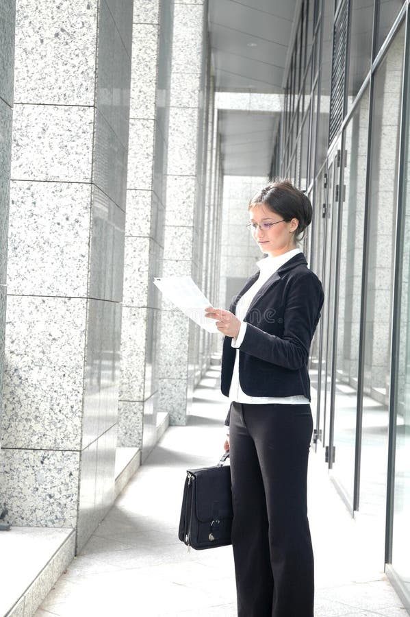 Business woman reading contract