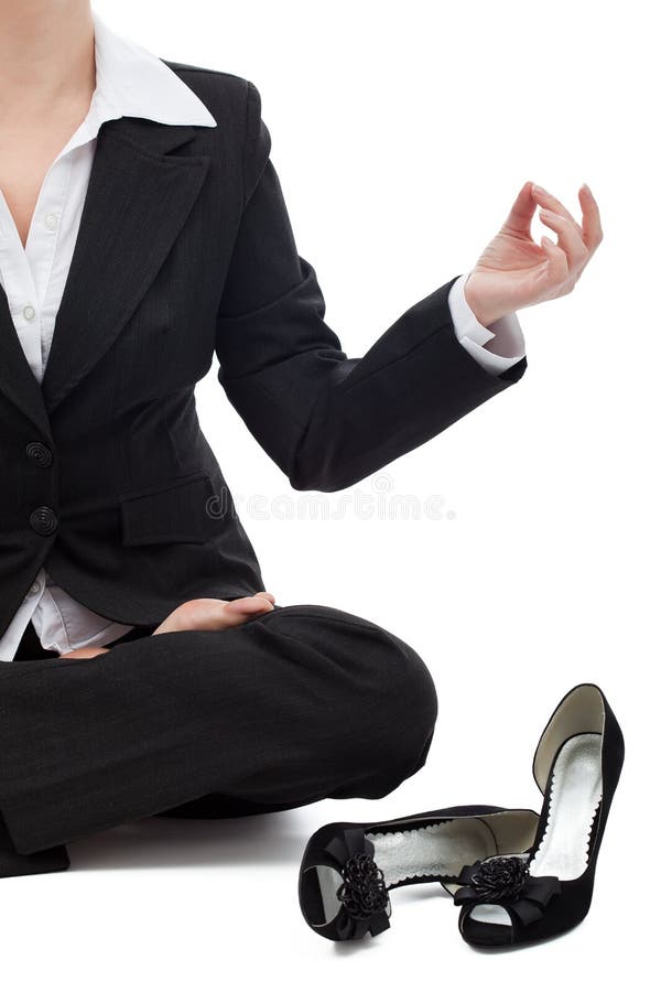 Business woman relaxing in the lotus position