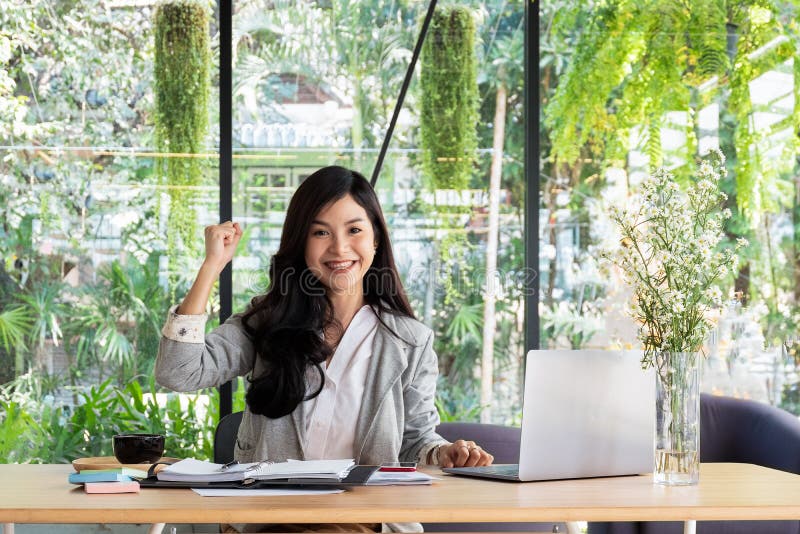 Business woman smiling with arms up celebrating for success work stock photos Business woman smiling with arms up celebrating for success work stock photos