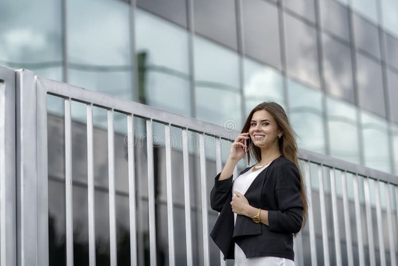 Business woman speaking cellphone stock image