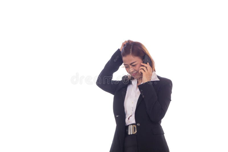 Business woman talk about work work with mobile phones and she`s a little tense