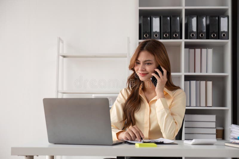Business Woman Talking on a Phone Call in Office. Happy Female