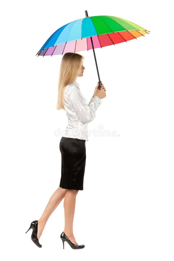 Business woman under umbrella