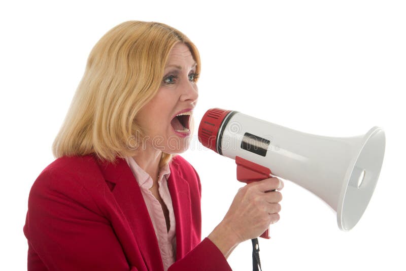 Attractive and smiling young executive business woman making her point really clear with the aid of a megaphone. Attractive and smiling young executive business woman making her point really clear with the aid of a megaphone.