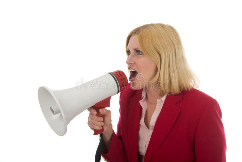 Attractive and smiling young executive business woman making her point really clear with the aid of a megaphone. Attractive and smiling young executive business woman making her point really clear with the aid of a megaphone.