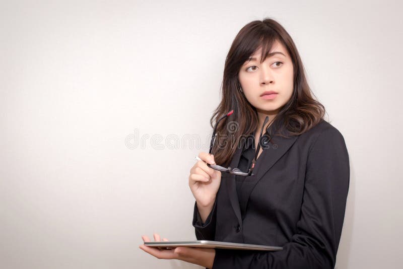 Business Woman Using a Touch Pad Tablet. Concept for Business Stock