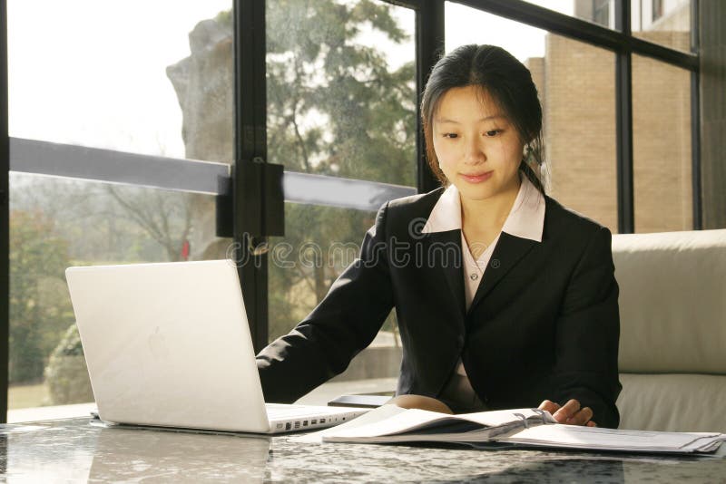 Business women working with laptop