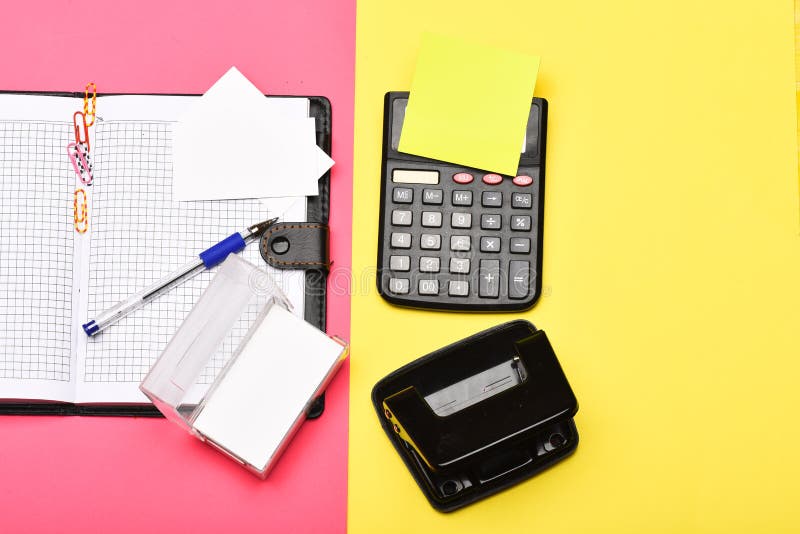 Business and work concept: calculator and stationery royalty free stock photography