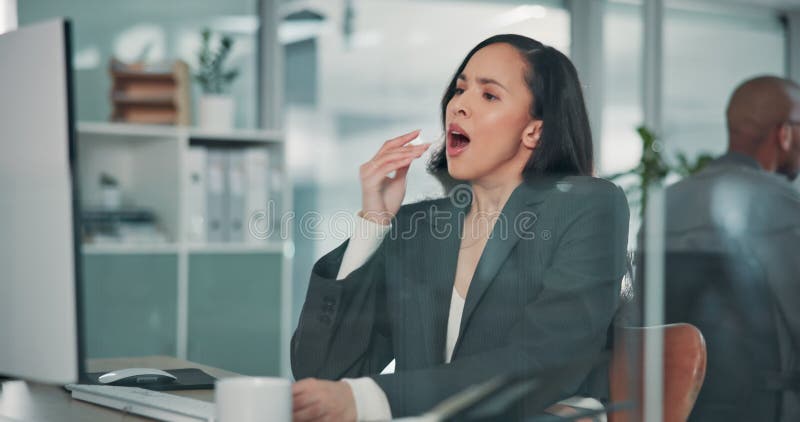 Business, yawning and woman in office, computer and tired with deadline, overworked and budget review. Person, employee stock video