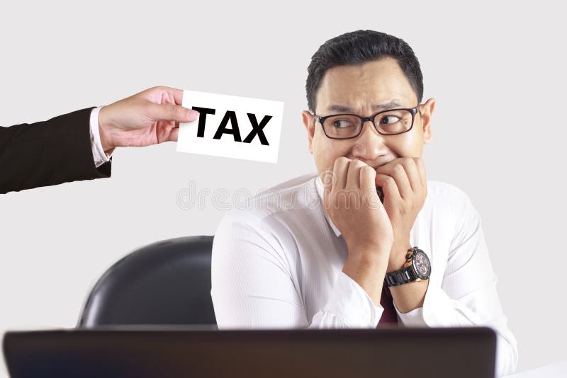 Businessman Afraid of Tax Concept stock photography Businessman Afraid of Tax Concept stock photography
