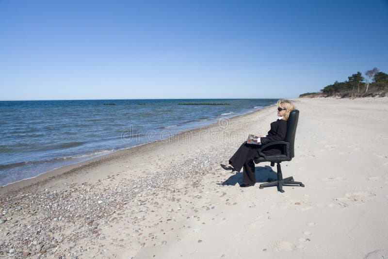 Businessman on beach