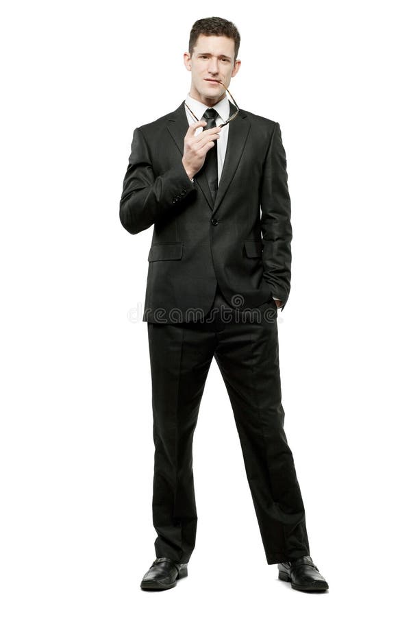 Businessman in black suit on white. stock photo