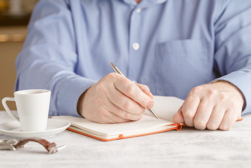 Businessman in a Blue Jacket with a Cup of Coffee Stock Image Image