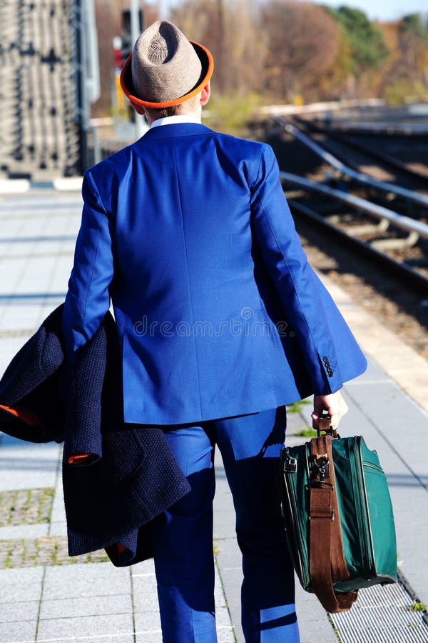 Businessman in Blue Suit Walking at Train Station Stock Photo Image